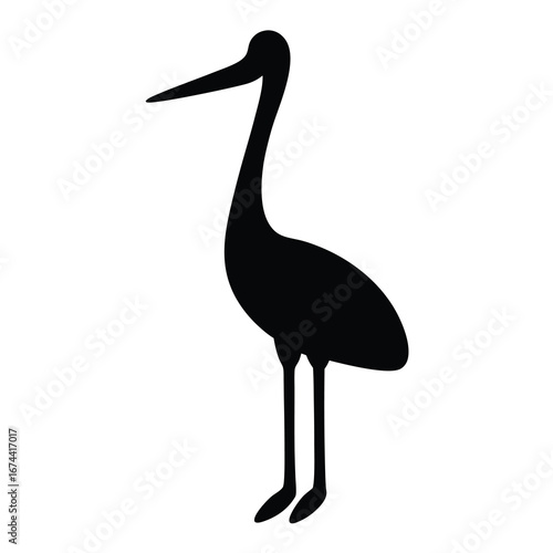 Silhouette of a stately black crane standing on a white background