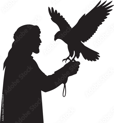 Silhouette of man in traditional headdress holding a falcon with spread wings falconry bird of prey