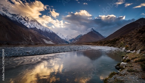 timelapse a quiet escape moody skies over himalaya mountain reflections cloud streaked sky the peaceful atmosphere captures the quiet beauty of nature in the evening reflections on the shyok river