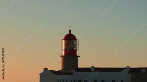 Explore Cape St. Vincent Lighthouse at sunset in Sagres, Portugal, overlooking the majestic Atlantic Ocean
