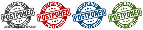postponed stamp. postponed round stamp set isolated on white background