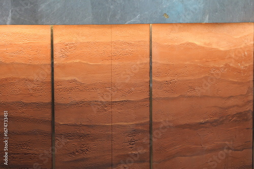 Quadro su tela Modern interior wall with a textured rammed earth finish