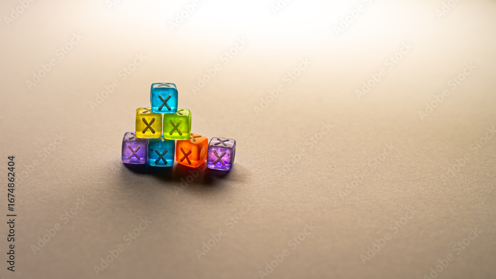 Obraz premium A small pyramid of six colorful translucent cubes with an