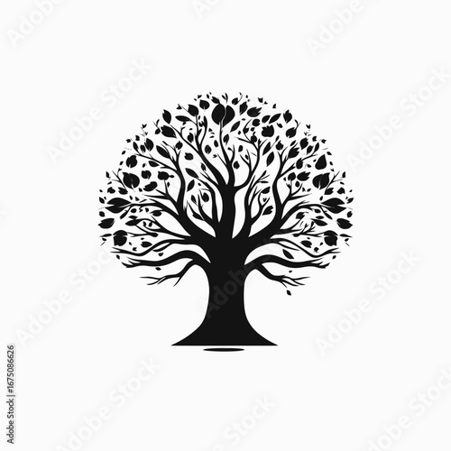 Majestic spreading tree branches with leaves in bold artistic silhouette