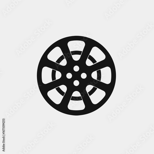 Bold black film reel minimal graphic representation against white background silhouette