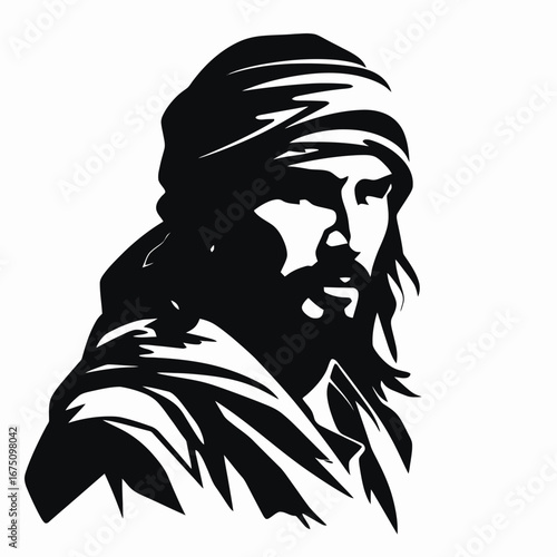 Artistic portrait of a man wearing a turban in dramatic silhouette