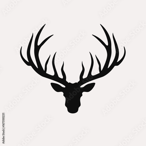 Striking antlered deer facing forward in bold monochrome color palette silhouette