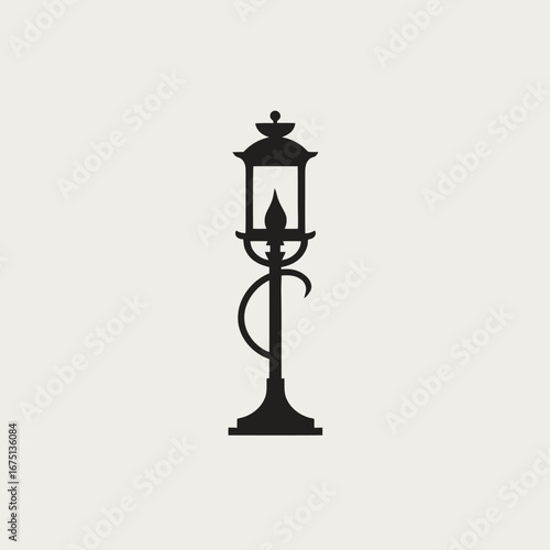Ornamental street lamp with a classic design casts an elegant silhouette