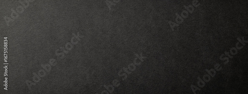 質感のあるチャコールグレーの紙の背景テクスチャー