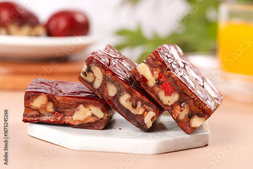 Delicious Xinjiang Date Walnut Pie Slices - Traditional Chinese Vegetarian Dessert with Chocolate Glaze