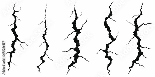 Set of five diverse black crack graphic elements on a white background for design