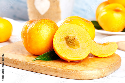 Fresh Yellow Peaches Sliced on Wooden Cutting Board - Healthy Summer Fruit