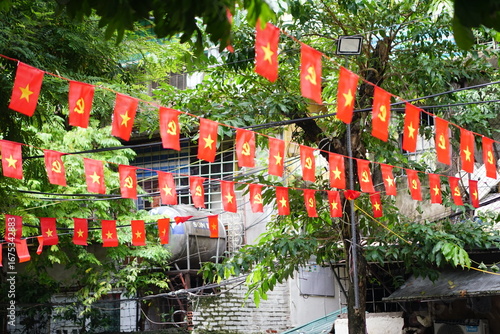 Hanging Vietnamese national flag displayed to celebrate the 80th anniversary of Vietnam National Day, September 2, 2025, marking the historic milestone with the A80 military parade in Hanoi. 