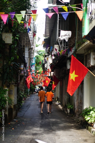 Hanging Vietnamese national flag displayed to celebrate the 80th anniversary of Vietnam National Day, September 2, 2025, marking the historic milestone with the A80 military parade in Hanoi. 