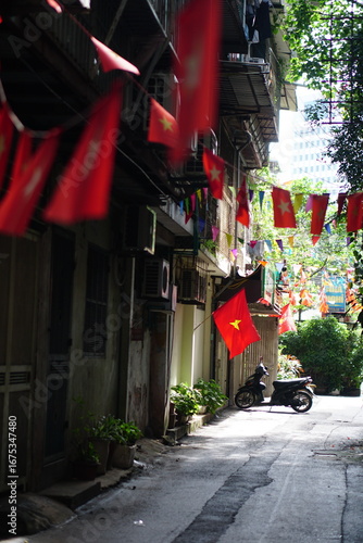 Hanging Vietnamese national flag displayed to celebrate the 80th anniversary of Vietnam National Day, September 2, 2025, marking the historic milestone with the A80 military parade in Hanoi. 