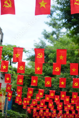 Hanging Vietnamese national flag displayed to celebrate the 80th anniversary of Vietnam National Day, September 2, 2025, marking the historic milestone with the A80 military parade in Hanoi. 