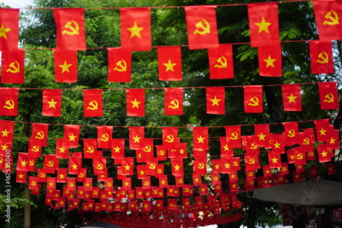 Hanging Vietnamese national flag displayed to celebrate the 80th anniversary of Vietnam National Day, September 2, 2025, marking the historic milestone with the A80 military parade in Hanoi. 