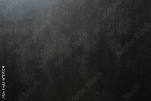 Dark grey textured concrete wall background