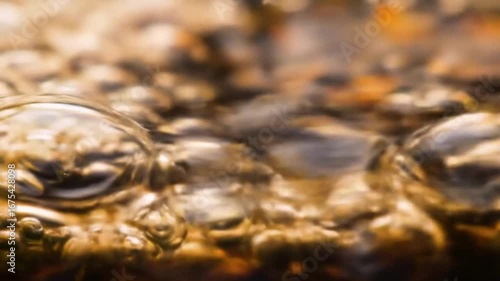 Wallpaper Mural Macro View of Effervescent Bubbles Rising in a Dark Liquid with Golden Light and Reflections Torontodigital.ca