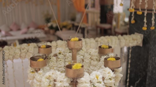 A Slow Motion Shot of Applying Mehndi on Bride's hand at her Indian Wedding in India
