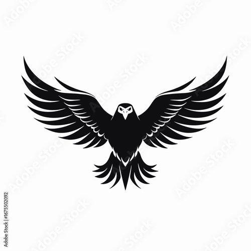 Powerful and majestic eagle with outstretched wings in dark silhouette