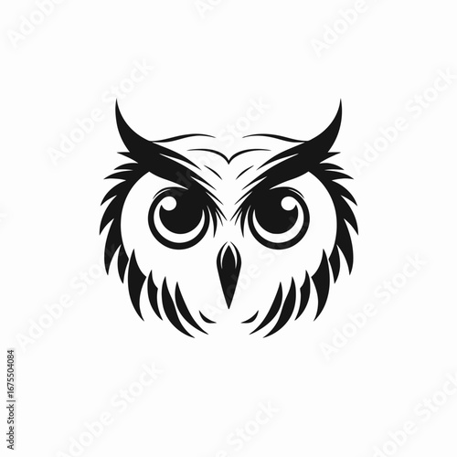 Majestic owl gazing forward intensely in a bold black silhouette