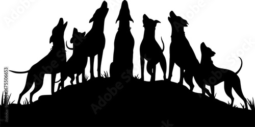 Silhouette of Howling Dogs on a Hill Against the Sky