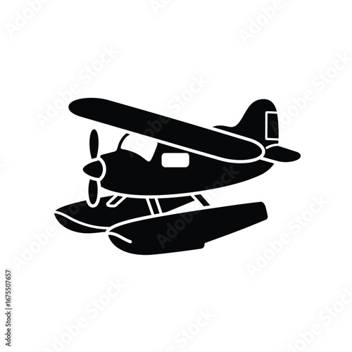 Silhouette of a classic seaplane with pontoons floating on water ready for takeoff or landing