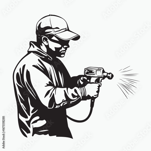 man spraying paint