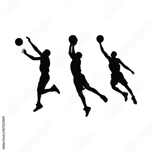 Silhouettes of basketball players in action during a game
