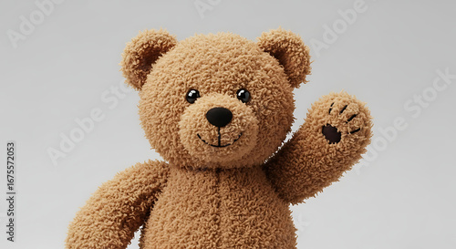 A charming studio shot of a brown teddy bear waving its paw, looking friendly.
