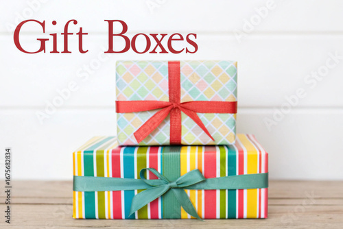 Two Stacked Gift Boxes with Colorful Wrapping Paper and Ribbons presents wrapped