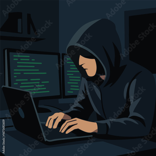 Hacker Working on a Laptop in the Dark


