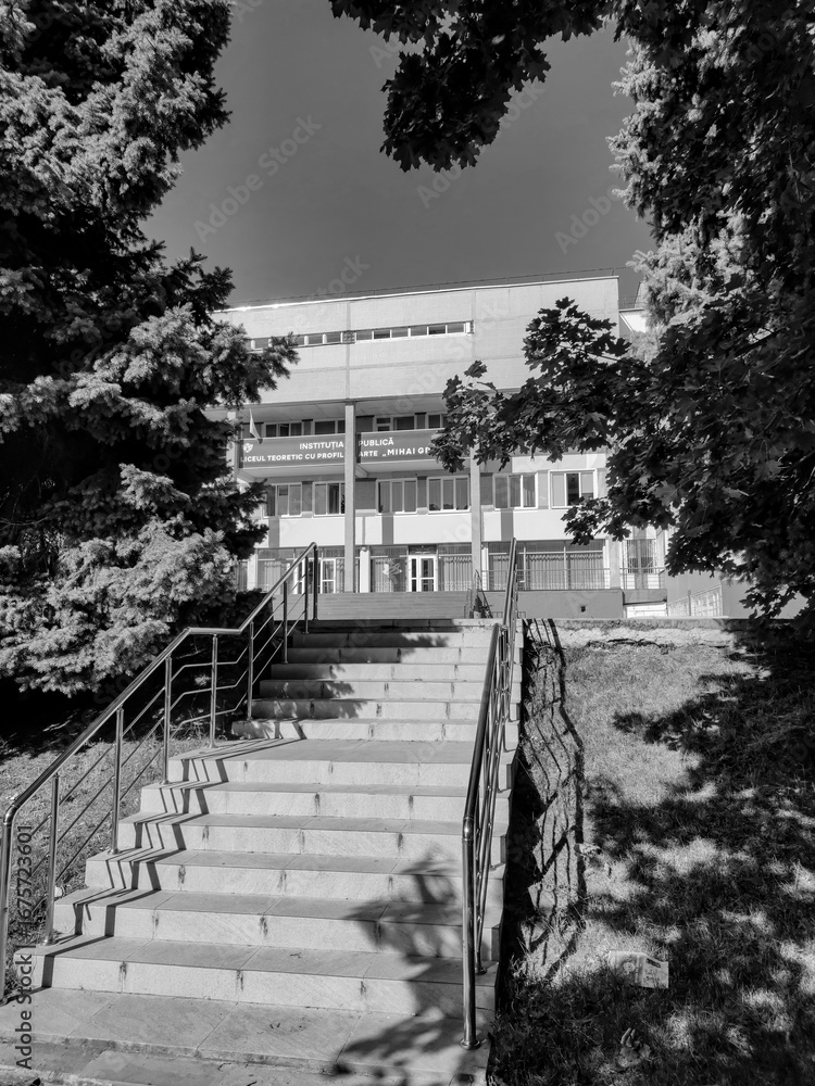 Fototapeta premium Monochrome view of a wide staircase ascending to the 