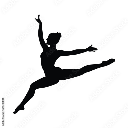 Silhouette of a graceful ballerina performing a split leap