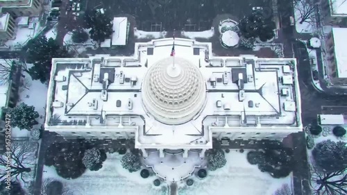 Aerial Top-down of White House, Washington DC. Snow falling in winter