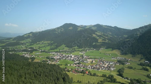 Drone view of an idylic village in the Austrian Alps.