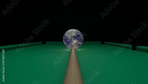 A cue stick aims at a billiard ball depicting planet Earth on a green table.