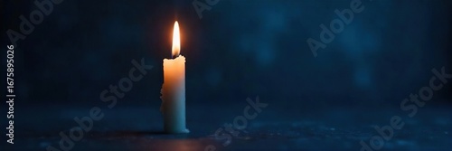 Close-up of a single candle flickering in the dark, casting a warm glow against a midnight blue backdrop; a subtle sense of hope and quiet reflection prevails ,  peaceful,  magical