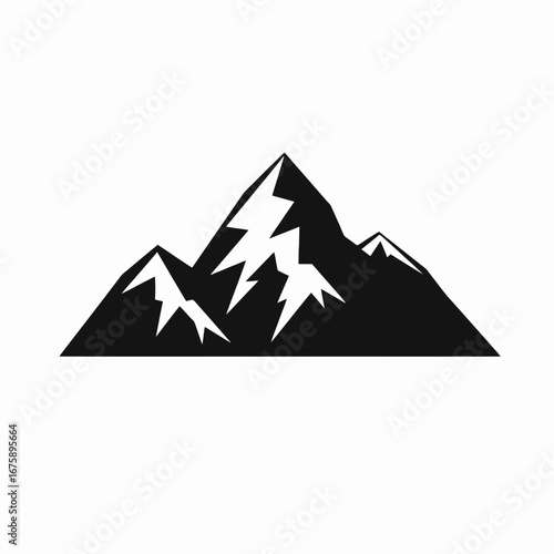 Majestic three peaks create striking and dramatic mountainous graphic silhouette