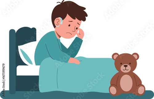 Young boy sitting in bed with teddy bear looking sad at night  