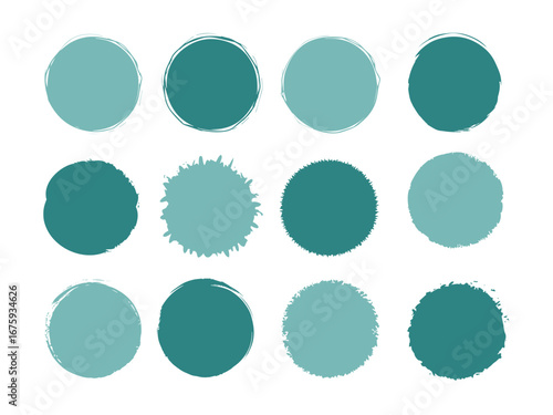 Variety of teal blue circle paint splatter shapes on a white canvas gives artistic flair