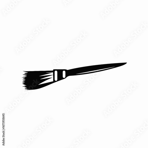 Isolated paintbrush for artwork and creative projects in black silhouette