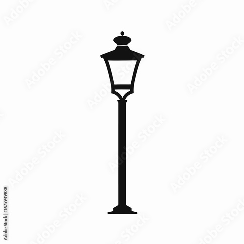 Elegant vintage street lamp isolated on white backdrop is a clean silhouette