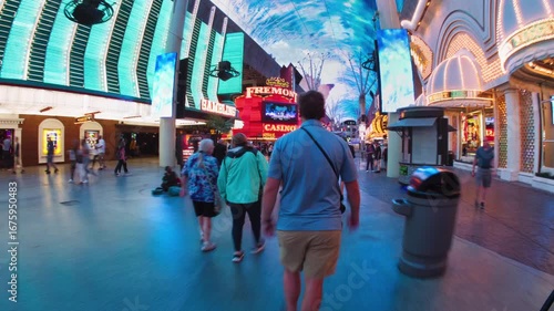 Man Walking Down Freemont Street in Las Vegas Nevada