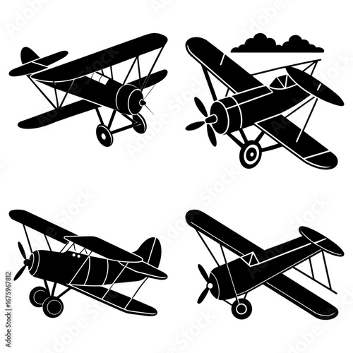 Collection of four black and white vintage biplane airplanes in various flying positions and orientations