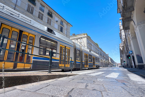 Fototapeta Naklejka Na Ścianę i Meble -  street and streetcar in the downtown of turin italy