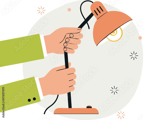 Hands holding vintage desk lamp for office or study lighting