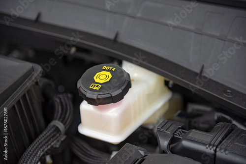 Bottle for brake fluid in the car