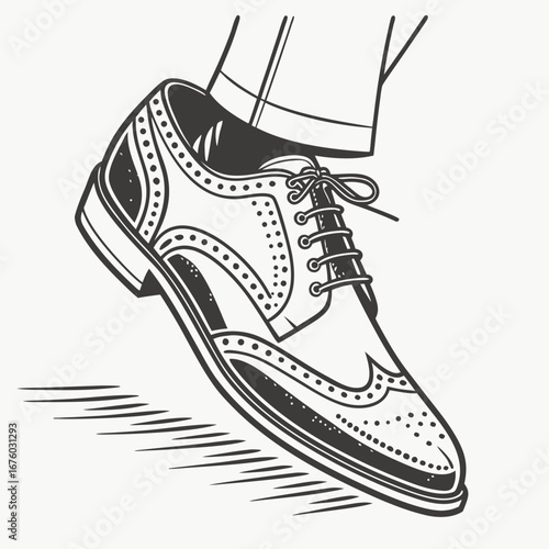 Classic wingtip oxford shoe with brogue detailing and laces being tied
